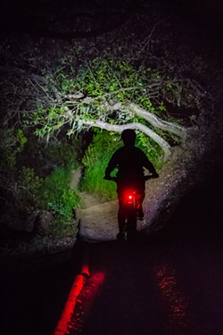 AFTER HOURS Cerro San Luis Mountain in SLO is now open for hiking and biking until 8:30 p.m., as part of a winter pilot program that launched on Nov. 4. Don't forget to claim a permit online, bring a light, and stay in groups. - FILE PHOTO BY JAYSON MELLOM