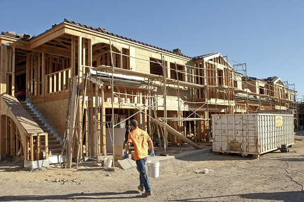 ROOFS OVER HEADS SLO County supervisors signed off on a three-year plan to boost funding for affordable housing, like the Las Lomas apartments in Atascadero (pictured under construction in 2013). - FILE PHOTO BY STEVE E. MILLLER