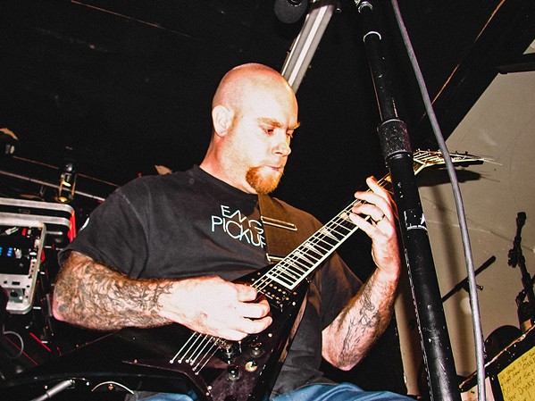 SHREDDER Known for his technical proficiency, Erik R. Lindmark (pictured) also fronted local metal band Charlie Christ. Two other local metal bands&mdash;Cryptolith and Stone Mountain&mdash;will play his celebration of life on Dec. 20, in Sweet Springs Saloon. - PHOTO COURTESY OF GISELE KINGSTON