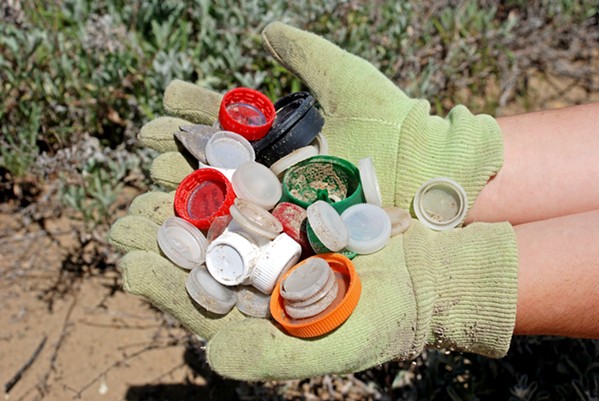 TRASH CAPS ECOSLO needs help continuing its Beach Keepers program into 2019. Contact the nonprofit at (805) 544-1777 to sponsor a cleanup day. - PHOTO COURTESY OF ECOSLO