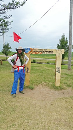 HALFWAY Arroyo Grande's Ben Walther walked 3,600 miles across the country in 2017 after surviving cancer. Here he is near Lebanon, Kansas, at the geographical center of the U.S. - PHOTO COURTESY OF BEN WALTHERS