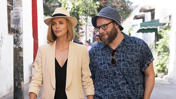 BEAUTY AND THE ... FLARSKY? Frumpy journalist Fred Flarsky (Seth Rogen, right), reunites with his first crush&mdash;beautiful, ambitious, but lonely presidential hopeful Charlotte Field (Charlize Theron)&mdash;who hires him as her speechwriter, in Long Shot. - PHOTO COURTESY OF DENVER AND DELILAH PRODUCTIONS