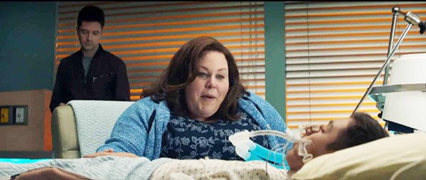 MIRACLE When her son, John (Marcel Ruiz), falls through lake ice and dies, Joyce (Chrissy Metz, center) prays for a miracle under the watchful eye of local pastor Jason Noble (Topher Grace), in Breakthrough. - PHOTO COURTESY OF FOX 2000 PICTURES