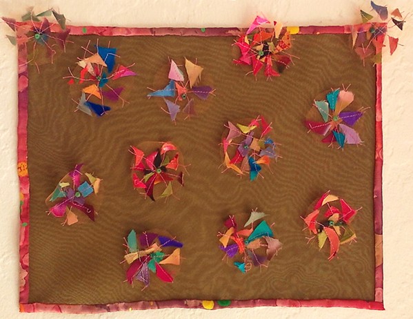 LEFTOVER Instead of buying new supplies, fiber artist Kate Froman is trying to use all of her leftover fabric scraps to make pieces like A Rare Desert Bloom. - PHOTO COURTESY OF KATE FROMAN