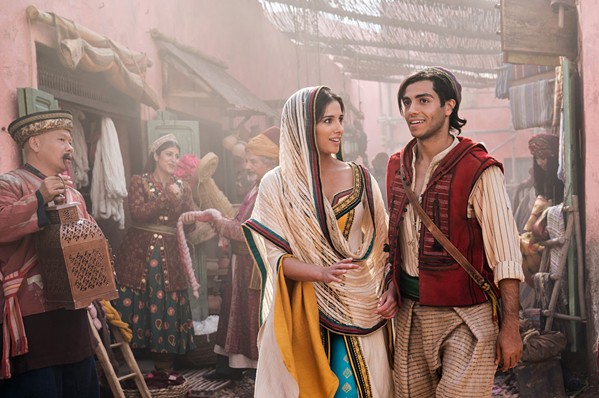 YOUNG LOVE Can street urchin Aladdin (Mena Massoud, right) win the heart of Jasmine (Naomi Scott)? Find out in the live-action remake of Aladdin. - PHOTO COURTESY OF WALT DISNEY PICTURES