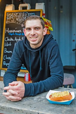 LOCAL BIZ Nick Regalia, 32, of SLO, started his street food business, Zen Dog, in 2016, and today he's the only vendor of his kind out in downtown SLO late at night, at McCarthy's Irish Pub. - PHOTO BY JAYSON MELLOM