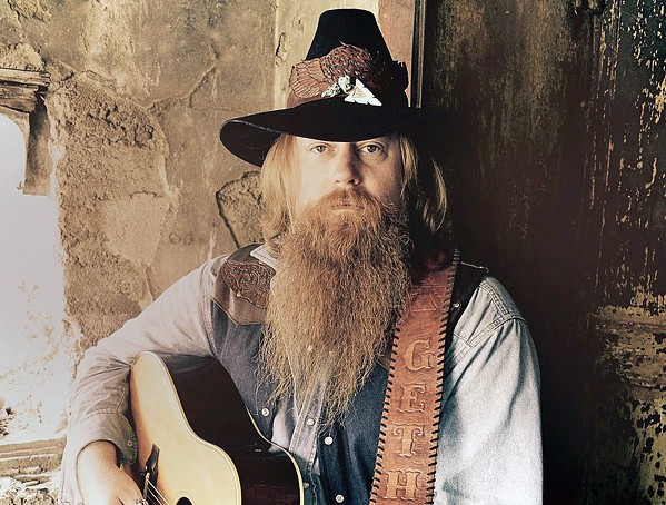 ALL-AMERICAN Gethen Jenkins&mdash;a U.S. Marine vet who was West Virginia-born but raised in an Alaskan Indian village&mdash;brings his original music to Sweet Springs Saloon on July 11. - PHOTO COURTESY OF GETHEN JENKINS