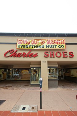 CLOSING WOES Charles Shoes closed in August after more than 50 years in business. Though the store's closure can't be blamed on any failings of the city or owners, its loss is representative of a greater issue that some say is deterring longtime residents from making the trip downtown. - PHOTO BY JAYSON MELLOM