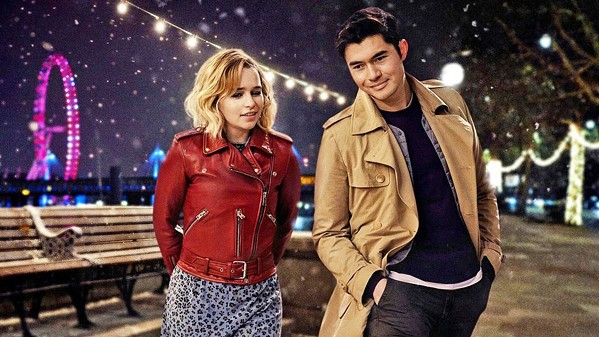 DECK THE HALLS Dysfunctional Kate (Emilia Clarke, left) works as Santa's elf at a year-round Christmas store, but when she meets Tom (Henry Golding), her life takes an unexpected turn, in the rom-com Last Christmas. - PHOTO COURTESY OF CALAMITY FILMS
