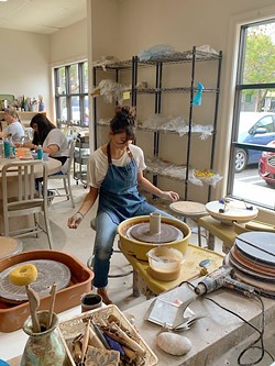 IN THE WORKS A potter spins up something new on a wheel at Anam Cre' Studio. - PHOTO COURTESY OF SHEVON SULLIVAN