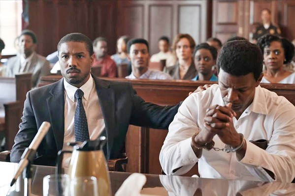 RACE AND JUSTICE Just Mercy tells the true story of attorney Bryan Stevenson (Michael B. Jordan, left) who works to free death row convict Walter McMillian (Jamie Foxx, right), who in 1987 was sentenced to die for a murder he didn't commit. - PHOTO COURTESY OF ENDEAVOR CONTENT