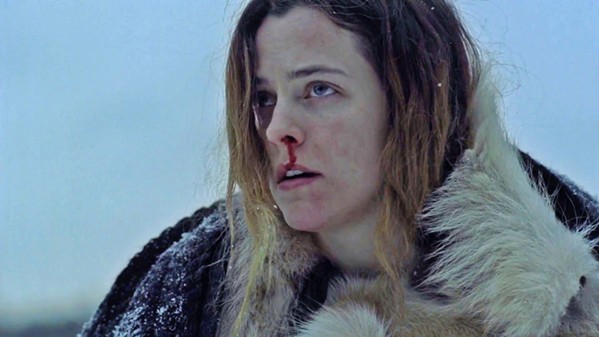 BUMPS IN THE NIGHT Trapped in a snowed-in lodge with two children, Grace (Riley Keough) experiences weird stuff that threatens to conjure psychological demons from her past, in The Lodge. - PHOTO COURTESY OF HAMMER FILMS
