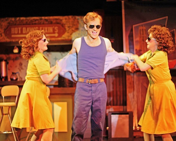 BENEATH THE SURFACE Double Cupp Diner runners Prudie and Rhetta Cupp (Katie Worley-Beck, left, and Eleise Moore, right, respectively) help gas station attendant L.M. (Mark Schenfisch) let loose during the musical number, "Farmer Tan." - PHOTOS COURTESY OF DAN SCHULTZ