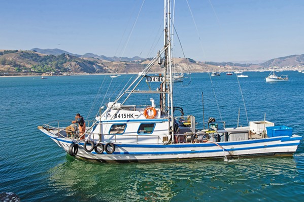 FISH OUT OF WATER Commercial fishing boats like this one are still allowed out on the water, but SLO County's public ramps in Morro Bay and Port San Luis are officially closed to recreational fishers and boaters. - FILE PHOTO BY JAYSON MELLOM