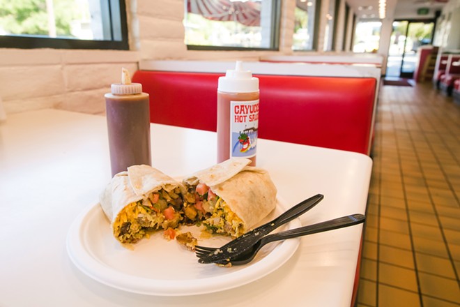 POUND IT Every year, almost without fail, Frank's Famous Hot Dogs in SLO takes home the Best Hangover Food and Best Breakfast Burrito awards. - PHOTO BY JAYSON MELLOM