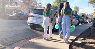 Thousands of St. Patrick's Day partiers damage Cal Poly dorms and neighborhoods near campus