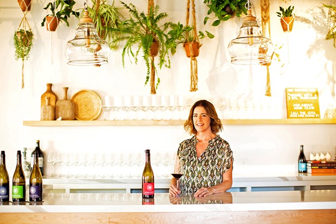 RAISING THE BAR While the Story of Soil tasting room is located in Los Olivos, owner and winemaker Jessica Gasca (pictured) collaborates with vineyards all over Santa Barbara County to create her varietals, including Duvarita Vineyard in Lompoc, Larner Vineyard in Ballard, and Gold Coast Vineyard in Santa Maria.