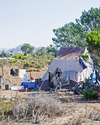 MOVE ALONG A small homeless encampment near the Los Osos library will be cleared out by the county this month.
