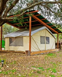 GLAMPING HEAVEN Branch Mill Organic Farms outside Arroyo Grande offers two tarp tent campsites, complete with beds, bathrooms, showers, and an outdoor kitchen.