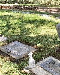 CLEANING WITH MEANING Loshel and Lisa Robinson have been maintaining graves since July; but they've been together for 11 years and married since 2015.