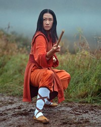 GIRL POW! Olivia Liang stars as Nicky Shen, a Chinese-monastery-trained martial artist who uses her skills to fight crime, in Kung Fu, a contemporary update of the 1970s Wild West series, currently screening on HBO Max.