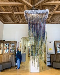 SPRING RAIN Cambria-based artist Carolyn Chambers took on this 8-foot-long installation piece hanging at the Cambria Center for the Arts thanks to inspiration from Lenore Tawney and Olga de Amaral, who transformed textile and fiber art in the mid-20th century.