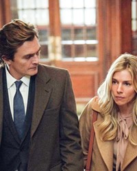 DID HE DO IT? When her politician husband, James Whitehouse (Rupert Friend), is accused of rape, Sophie (Sienna Miller) looks to their past for clues to his culpability, in Anatomy of a Scandal, streaming on Netflix.