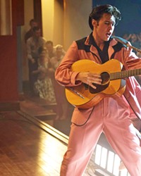 RAW SEXUALITY Austin Butler takes on the role of Elvis Presley, in auteur Baz Luhrmann's spectacular musical biopic, Elvis, playing in local theaters.