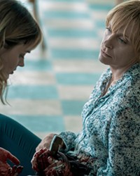 GHOST FROM THE PAST When Laura (Toni Collette, right) turns out to have a secret past, her daughter, Andy (Bella Heathcote), begins to question their life together as both become targets, in the Netflix TV series Pieces of Her.