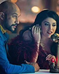 THE SCHWINDY CITY! After their relationship flags, Josh (Keegan-Michael Key) and Melissa (Cecily Strong) try to find Schmigadoon again, this time arriving in Schmicago, a world based on musicals from the '60s through the '80s, in season 2 of Schmigadoon!, streaming on Apple TV-plus.