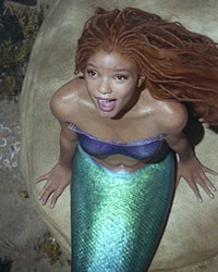 YEARNING Ariel (Halle Bailey) desperately wants to explore the human world above the water, in the new live-action version of The Little Mermaid, screening in local theaters.