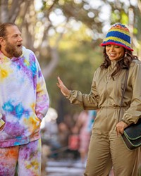 I DO Ezra (Jonah Hill) proposes to Amira (Lauren London), but as they get to know one another's families, the couple discovers race relations are more complicated than they thought, in You People, streaming on Netflix.