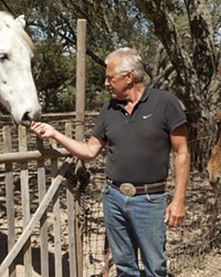 HORSE HEALING :  Angel (left), Hans van Randwijk, and Pita (right) are lending a helping hand&mdash;and hoof&mdash;to people in need.