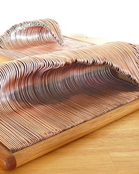 MAKING WAVES: CAYUCOS ELECTRICIAN CASS HOLUK TURNS COPPER WIRES INTO ART