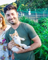 SMALL BIZ UNDER FIRE Megan's Organic Market co-founders Megan Souza and Eric Powers face an uncertain future as SLO County sues to stop the delivery service's cannabis grow in Los Osos.