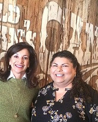 FOR THE CHILDREN Old Juan's Cantina co-owner Eva Verdin (right) presented Jack's Helping Hand co-founder Bridget Ready (left) a check for $5,000 to support a universally accessible children's playground.