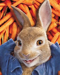 SILLY RABBIT Tensions build between Peter (voiced by James Corden) and Mr. McGregor (Domhnall Gleeson) as they rival for the affections of Bea (Rose Byrne) in Peter Rabbit.