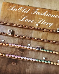 CREATIVE DISPLAYS Twisted &amp; Glazed doughnut shop in Paso Robles brings more to weddings than just doughnuts. It can also help design creative doughnut displays like shelves or wall hooks.