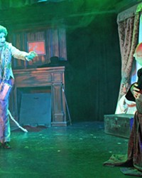 LIFE CHAIN-GING After a chilling encounter with the ghost of his deceased colleague, Jacob Marley (Jeff Salsbury, left), Ebenezer Scrooge (Billy Breed, right) is visited by three spirits, in A Christmas Carol.